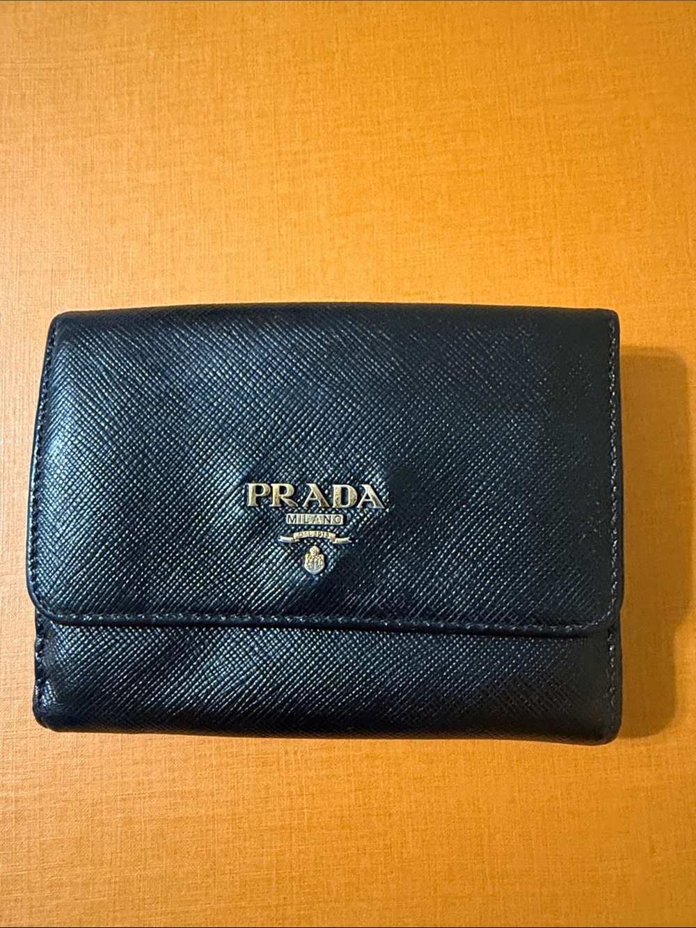 Prada Black Saffiano Leather Trifold Wallet with Gold Logo